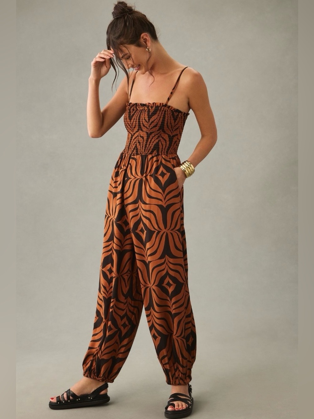 By Anthropologie Balloon
Leg Jumpsuit Orangish Brown & Black Smocked Bodice